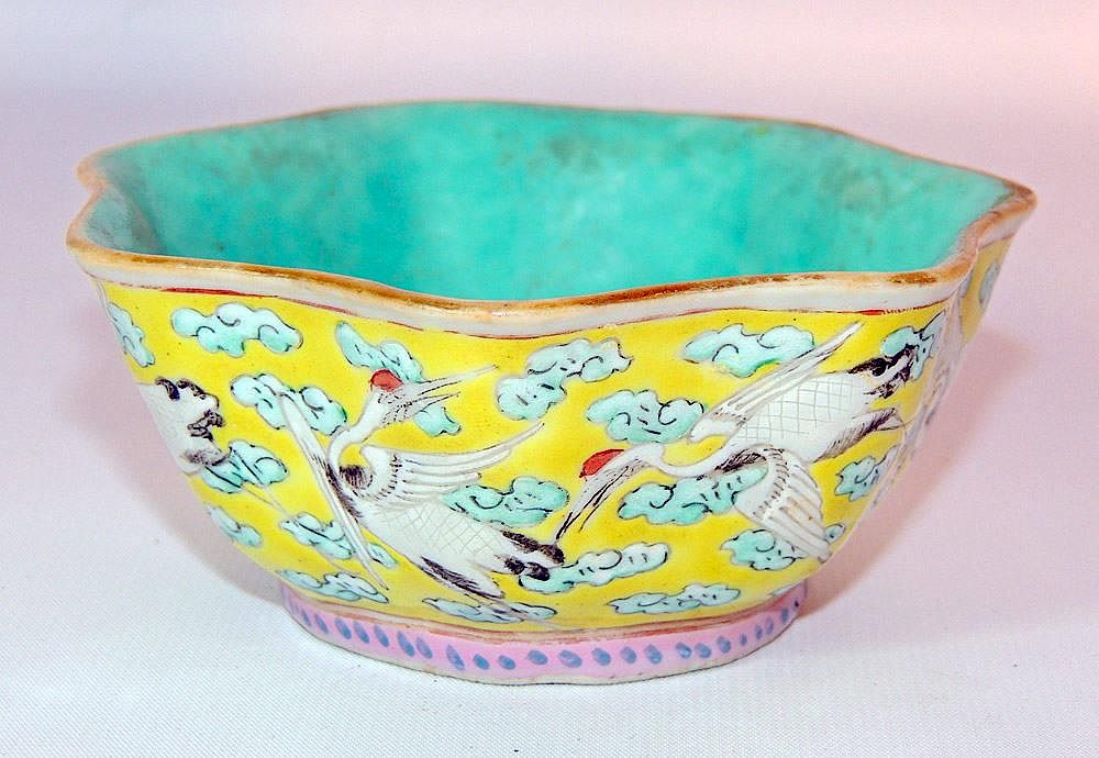 Appraisal: Chinese Porcelain Yellow Bowl Crane decoration on yellow ground Qianglong