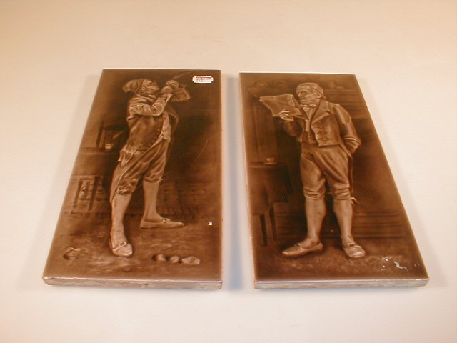 Appraisal: A pair of sepia glazed portrait tiles - portraits of