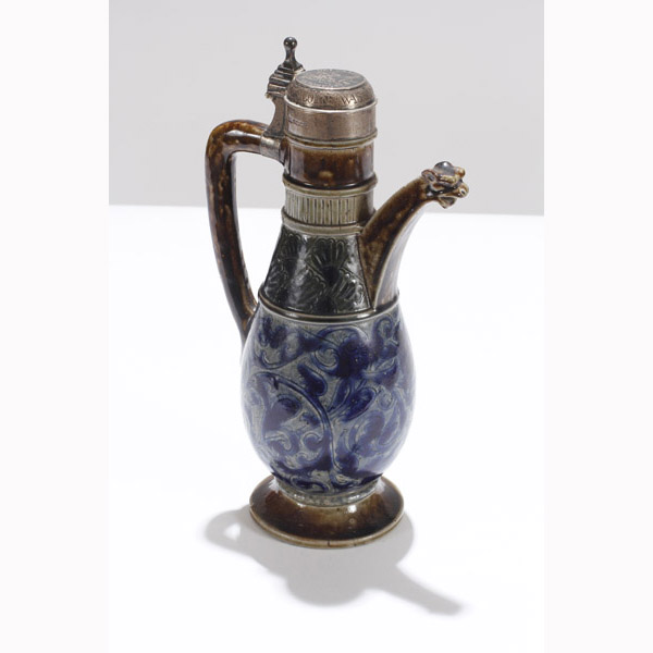 Appraisal: Martin Brothers silver mounted English stoneware flagon with figural griffin