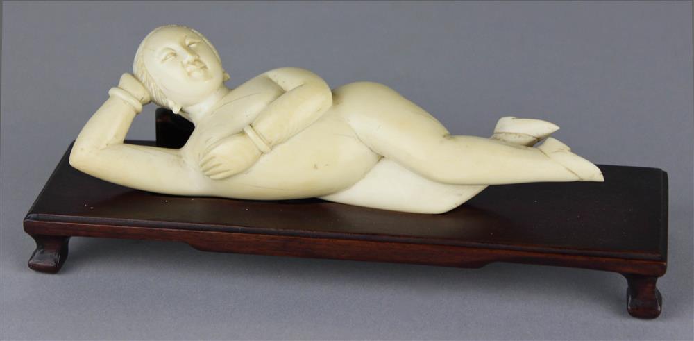 Appraisal: CHINESE IVORY RECUMBENT MEDICINE DOLL FIGURE TH C the beauty