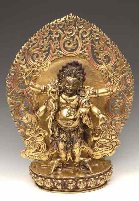 Appraisal: A TIBETAN GILT BRONZE FIGURE OF MAHAKALA the six arms