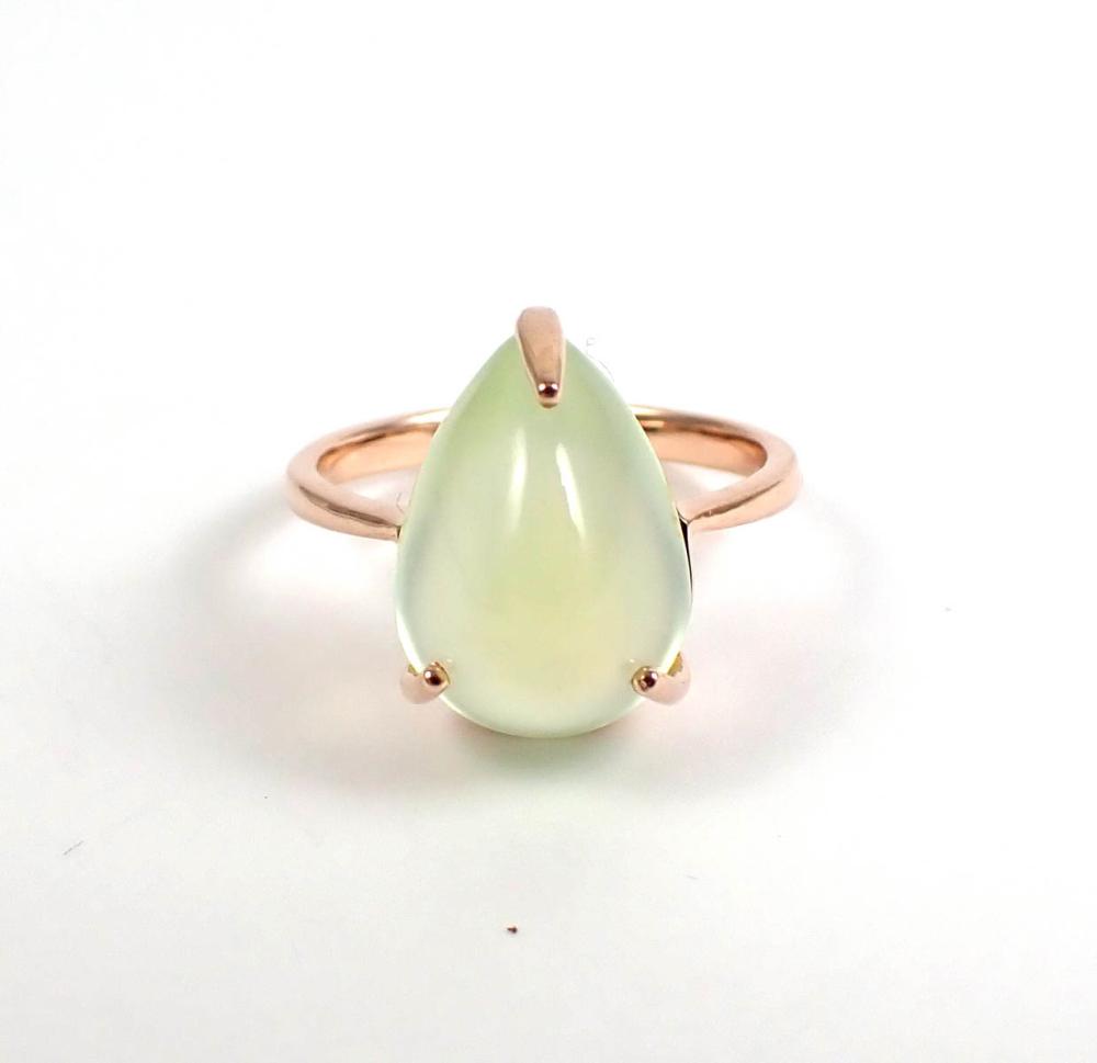 Appraisal: PREHNITE AND FOURTEEN KARAT GOLD SOLITAIRE RING The k rose