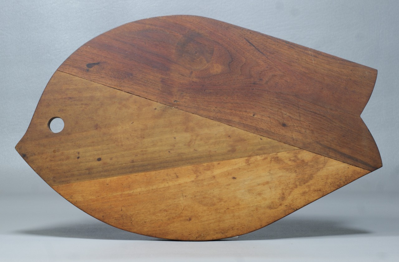 Appraisal: Walnut and cherry fish form cutting board purchased from Wharton