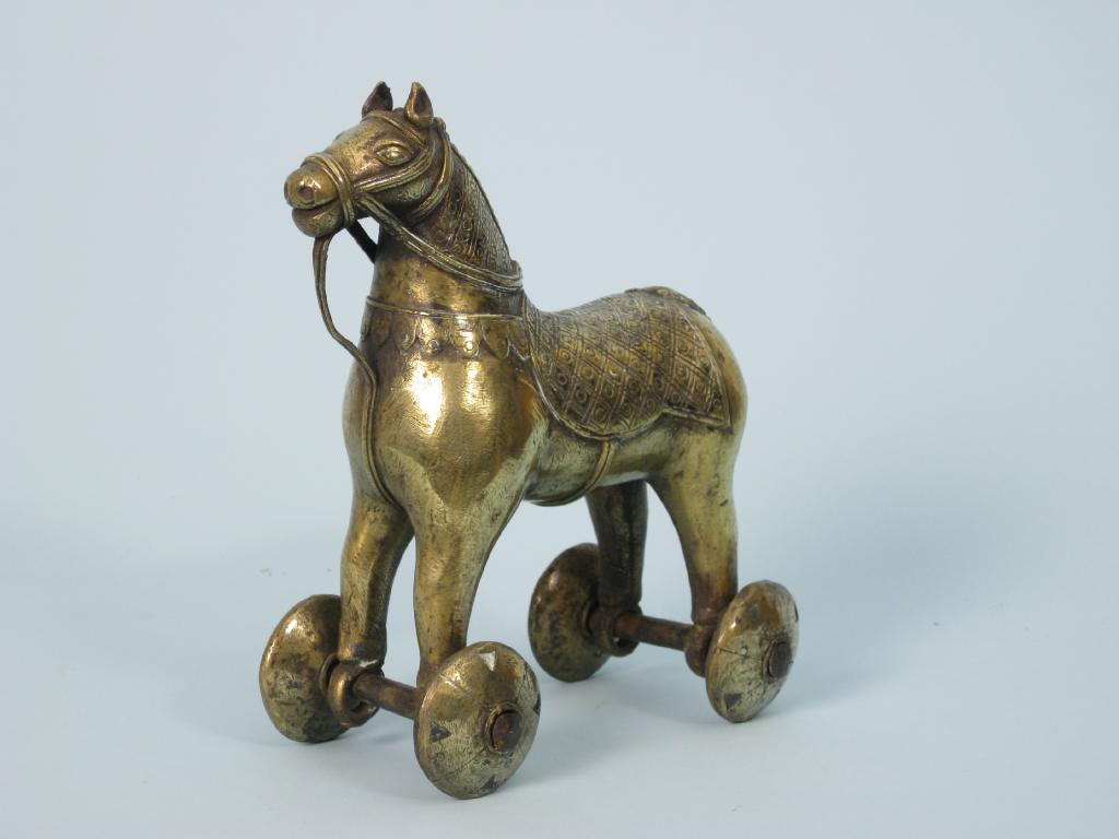 Appraisal: A th Century Indian brass Horse with trellis decorated saddle