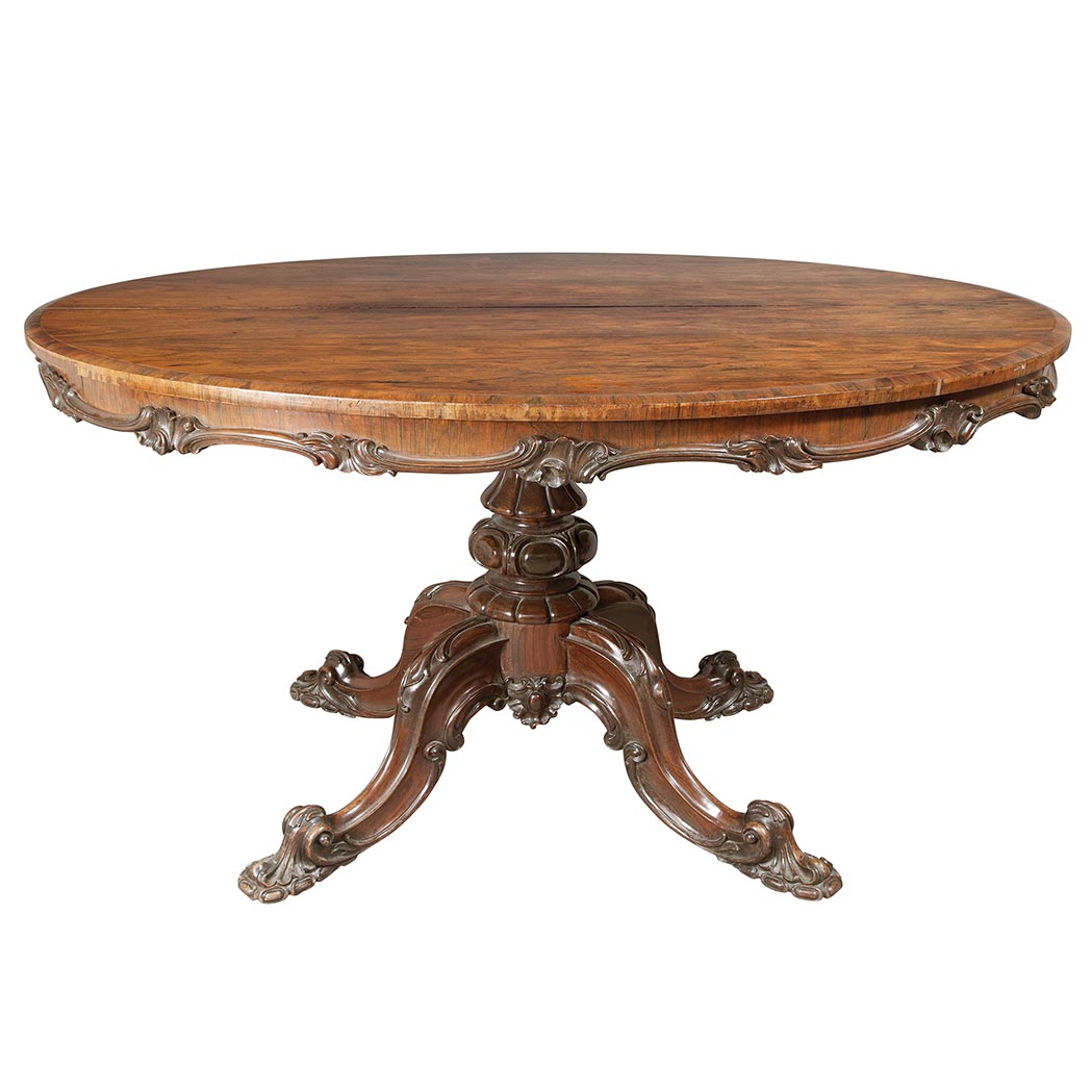 Appraisal: Victorian Rosewood Tilt-Top Breakfast Table The oval top above an