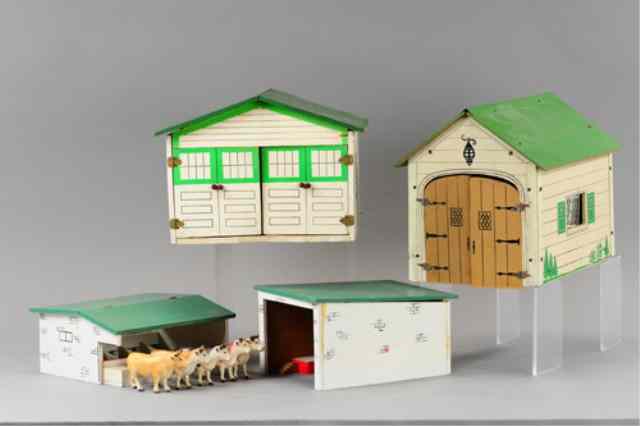 Appraisal: FOUR MINIATURE BUILDINGS Great for auto displays includes composition and