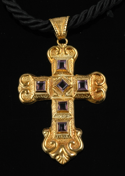 Appraisal: An amethyst cross pendant The large ct gold decorative scrolled