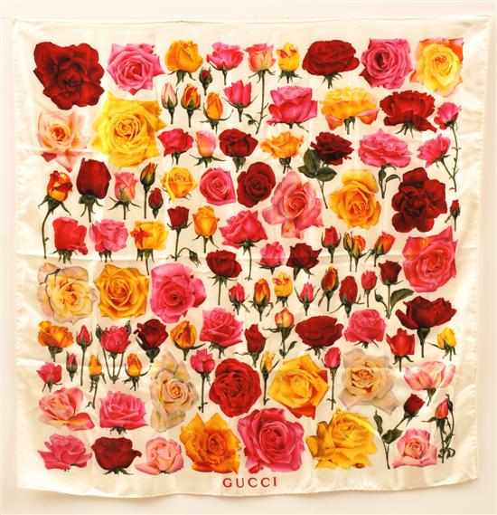 Appraisal: A SILK SCARF BY GUCCI Printed with a repeat design