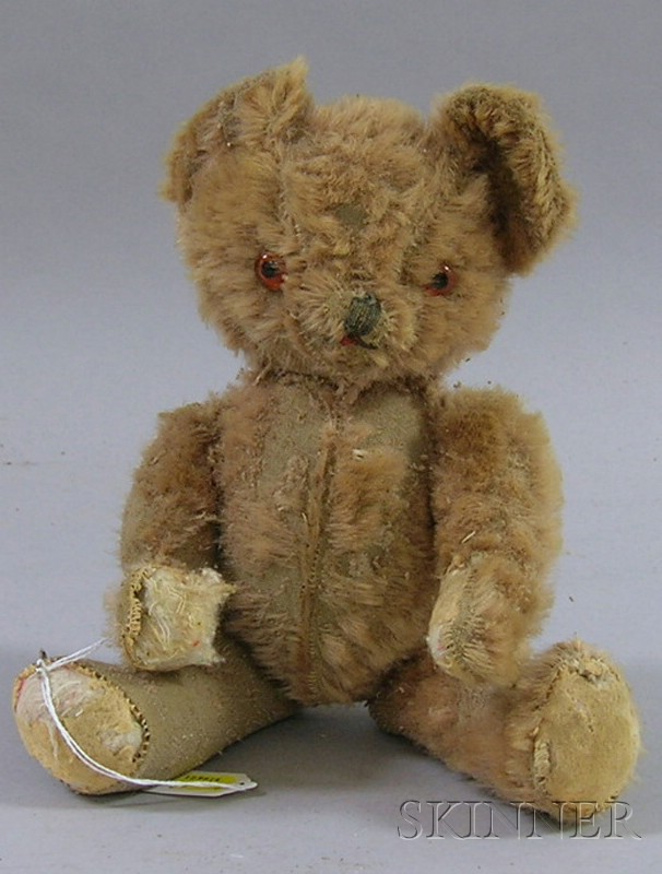 Appraisal: Articulated Mohair Teddy Bear glass eyes ht in losses damage