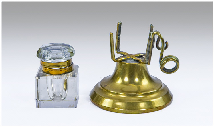 Appraisal: Inkwell and pen holder the polished concave brass base supporting