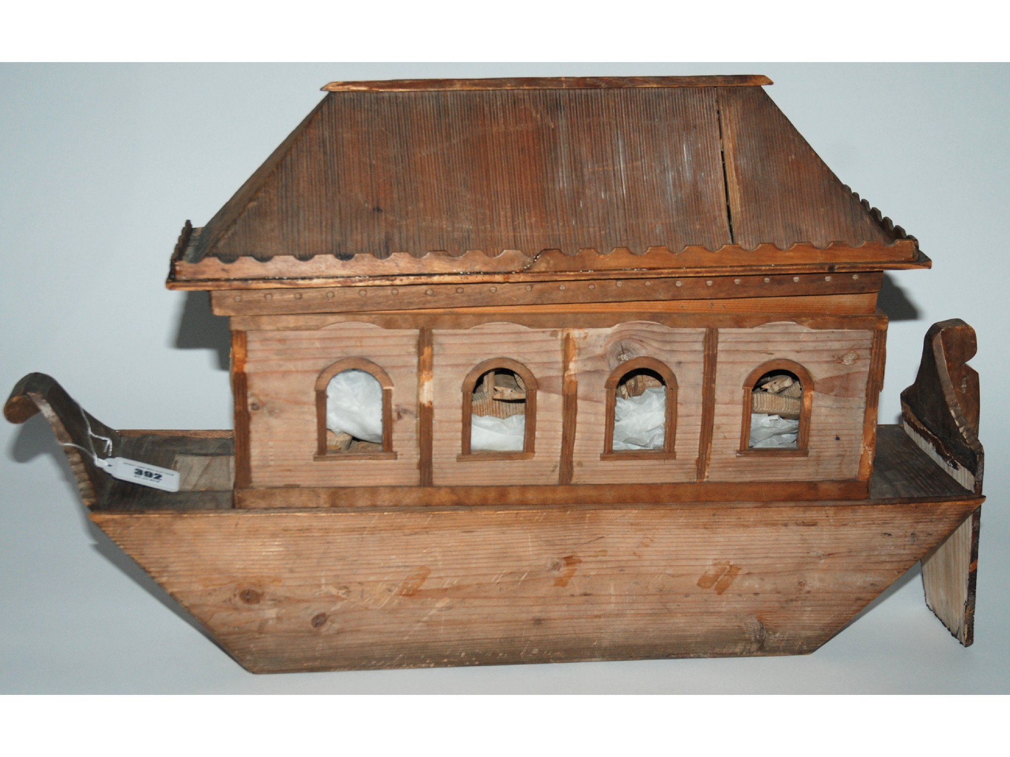 Appraisal: A wooden Noah's Ark with carved wooden animals def