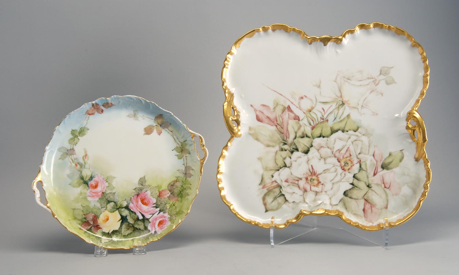 Appraisal: TWO HAND-PAINTED LIMOGES TRAYS one four-lobed tray with floral decoration