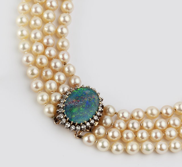 Appraisal: A CULTURED PEARL MULTI-STRAND NECKLACE WITH DETACHABLE DIAMOND AND GEM