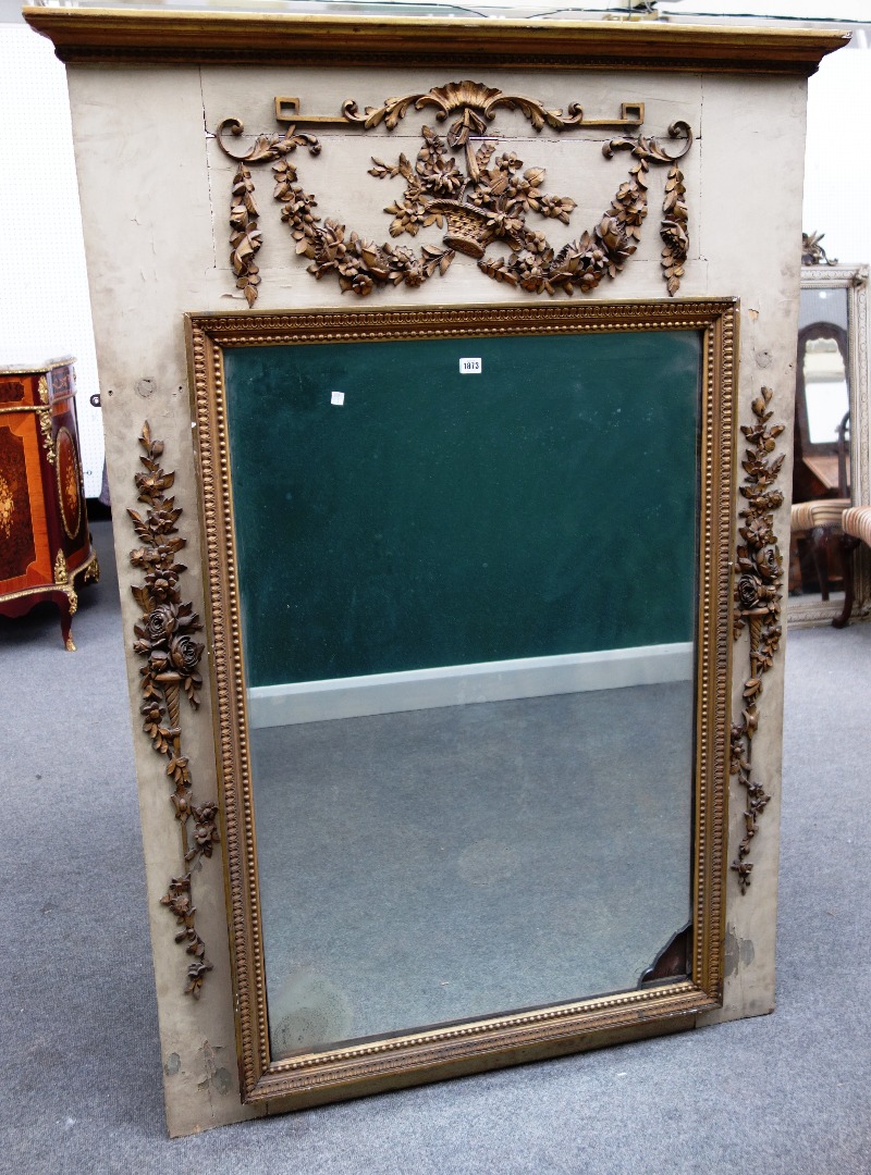 Appraisal: A th century French gilt framed wall mirror the cream