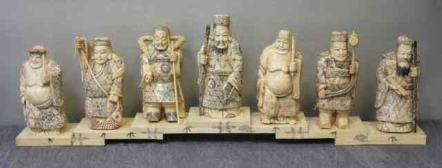 Appraisal: Large Asian Group of Figures on Stand From a Jamaica