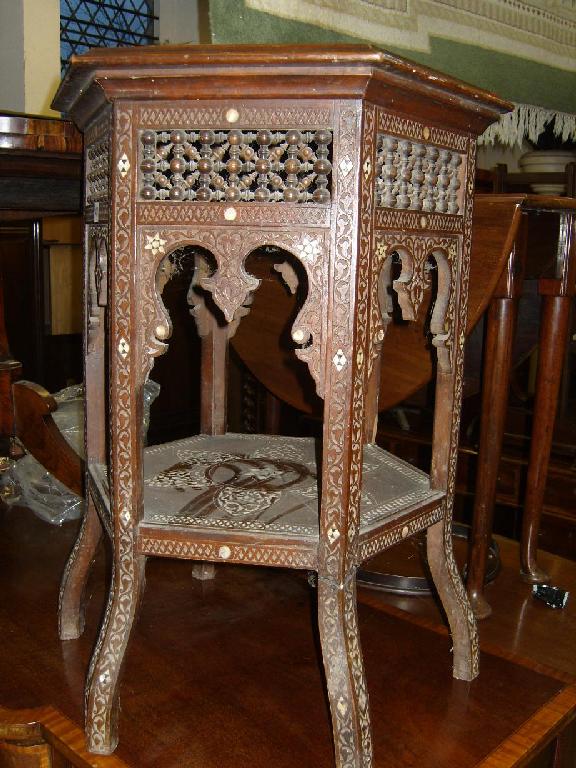 Appraisal: A middle eastern hardwood occasional table of hexagonal form with