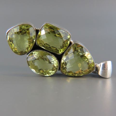 Appraisal: Lemon Citrine Pendant four fancy cut gems weighing carats in