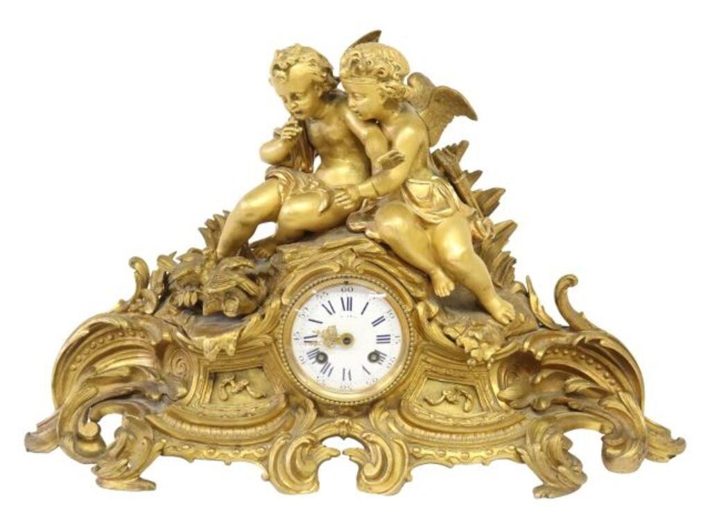 Appraisal: FRENCH LOUIS XV STYLE ORMOLU STRIKING MANTEL CLOCKFrench Louis XV