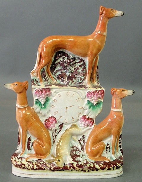 Appraisal: Staffordshire figural group of whippets with game h x w