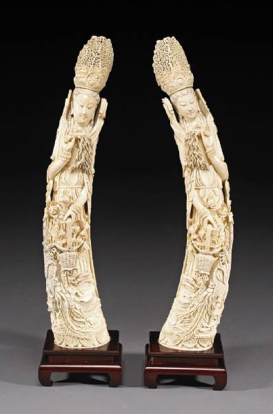 Appraisal: A pair of pieced ivory figures of Guanyin Each elongated