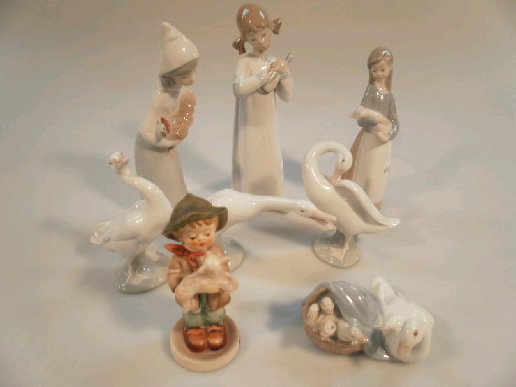 Appraisal: Three Lladro figures of children four Lladro duck ornaments and