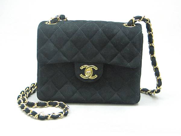 Appraisal: A Chanel Classic Flap black quilted suede bag approximate height