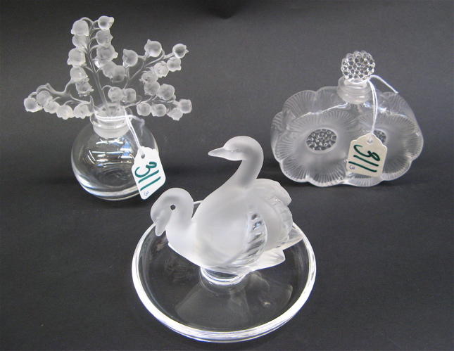 Appraisal: TWO LALIQUE PERFUMES AND A RING HOLDER pieces The perfumes