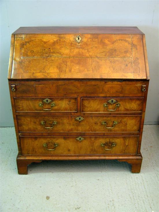 Appraisal: George II Walnut Bureau the interior with various bowfronted and