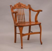 Appraisal: A Carved Oak Arm Chair A fine yellow oak chair