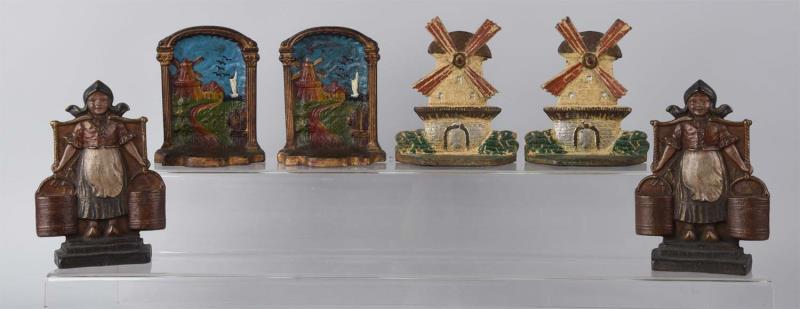 Appraisal: Cast Iron Assorted Windmill Dutch Girl Bookends Condition Very Good