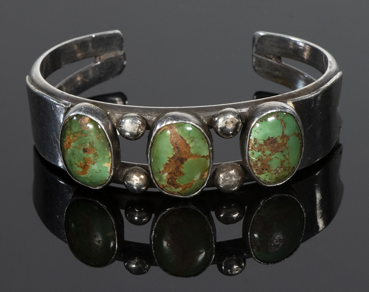 Appraisal: NATIVE AMERICAN SILVER BRACELET WITH GREEN TURQUOISE STONES Unmarked late