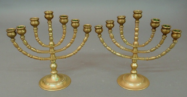 Appraisal: Pair of brass menorah h x w