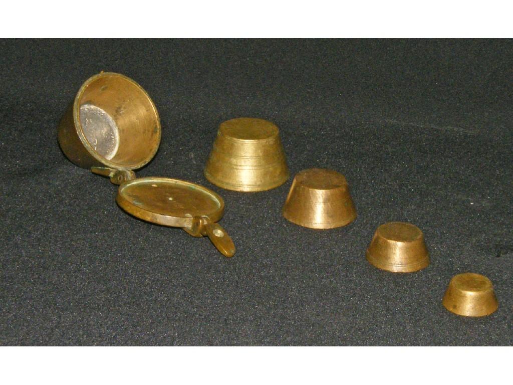 Appraisal: Set of five graduated th century brass cup weights the