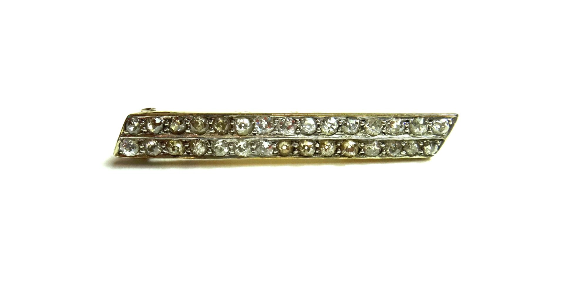 Appraisal: A gold and diamond set brooch designed as two rows