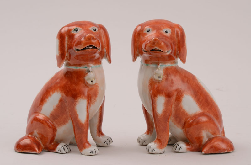 Appraisal: PAIR OF CHINESE EXPORT PORCELAIN FIGURES OF SEATED PUPS Each