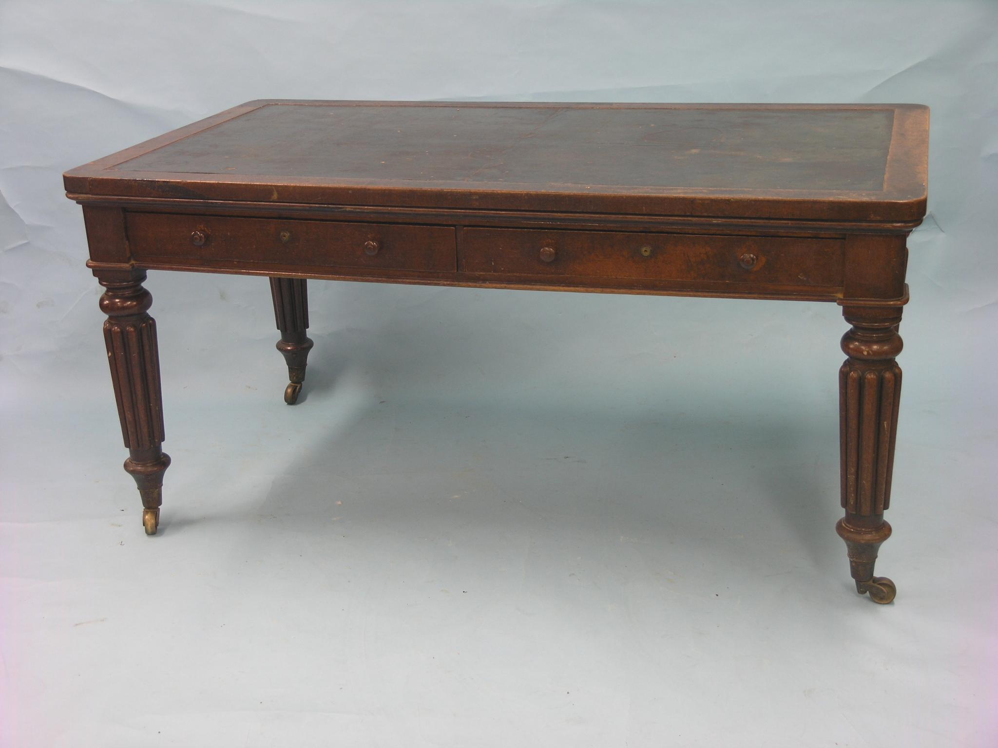 Appraisal: An early Victorian oak desk inset leather top above two