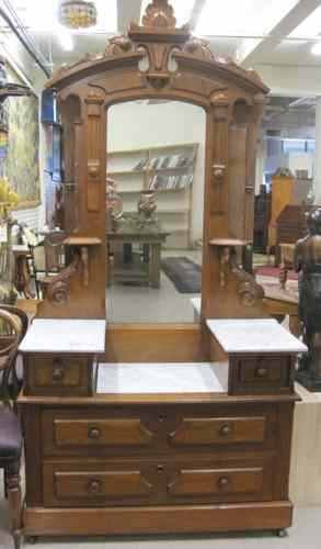 Appraisal: VICTORIAN WALNUT VANITY DRESSER Renaissance Revival design American c the