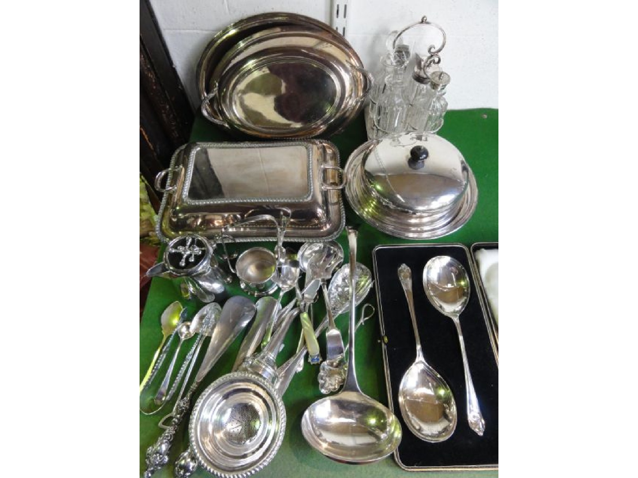 Appraisal: A collection of silver plated wares including an entr e