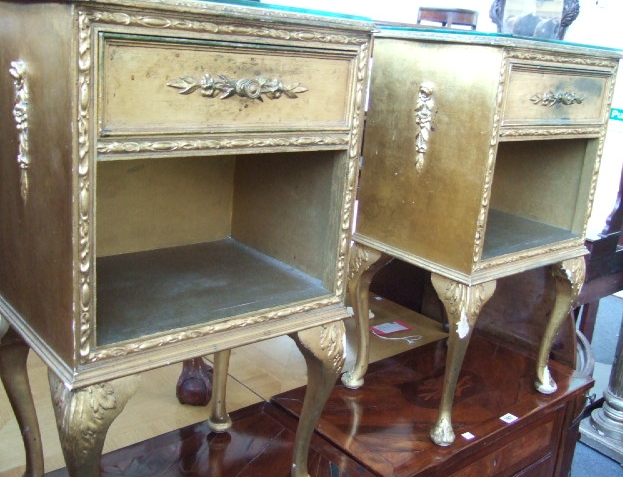 Appraisal: A pair of th century gold painted Louis XV style