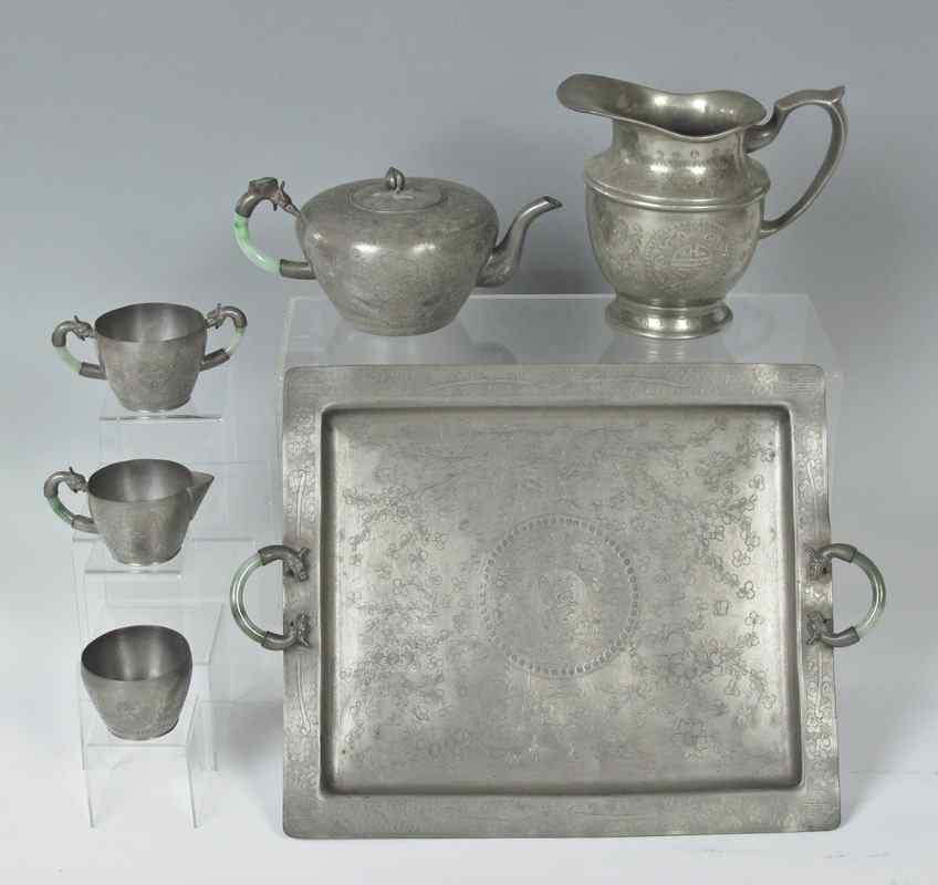 Appraisal: CHINESE PEWTER TEA SET WITH JADE HANDLES Circa 's with