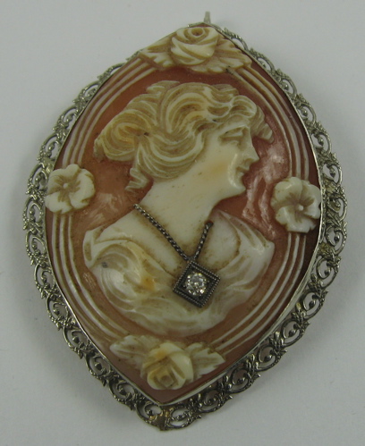 Appraisal: VICTORIAN CAMEO PENDANT BROOCH the relief-carved shell cameo a portrait