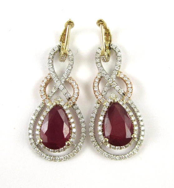 Appraisal: PAIR OF RUBY AND DIAMOND EARRINGS with AGI appraisal Each