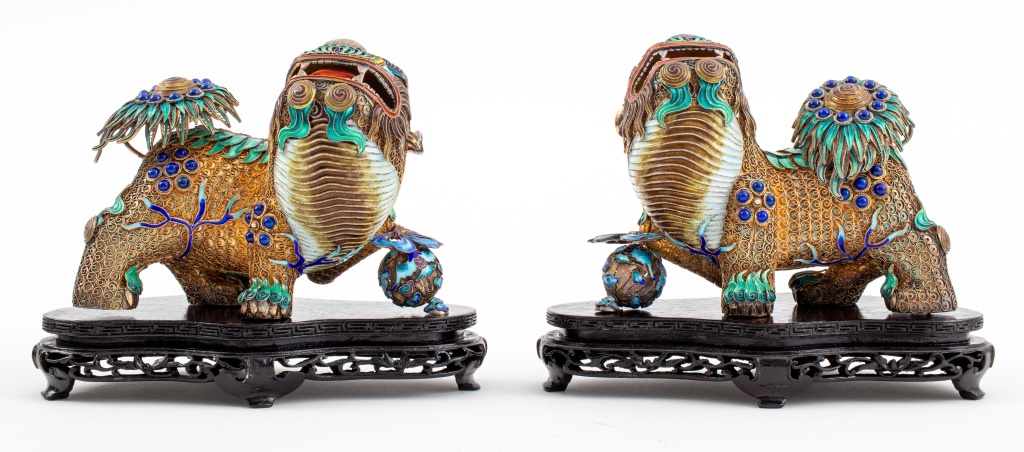 Appraisal: CHINESE SILVER ENAMEL STONE INLAID FOO LIONS PAIR Pair of