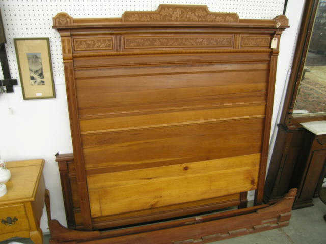 Appraisal: Victorian Carved Walnut Bed acorn oak leaf design