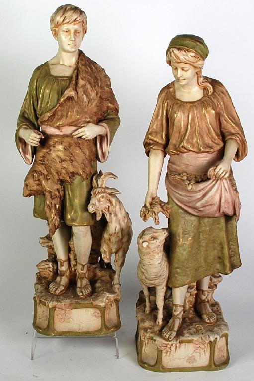 Appraisal: PAIR OF LARGE ROYAL DUX PORCELAIN FIGURES painted in muted