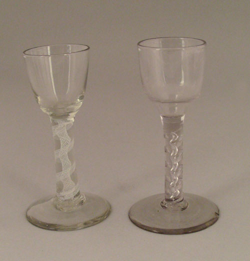 Appraisal: Two English clear glass cordials th c with air twist