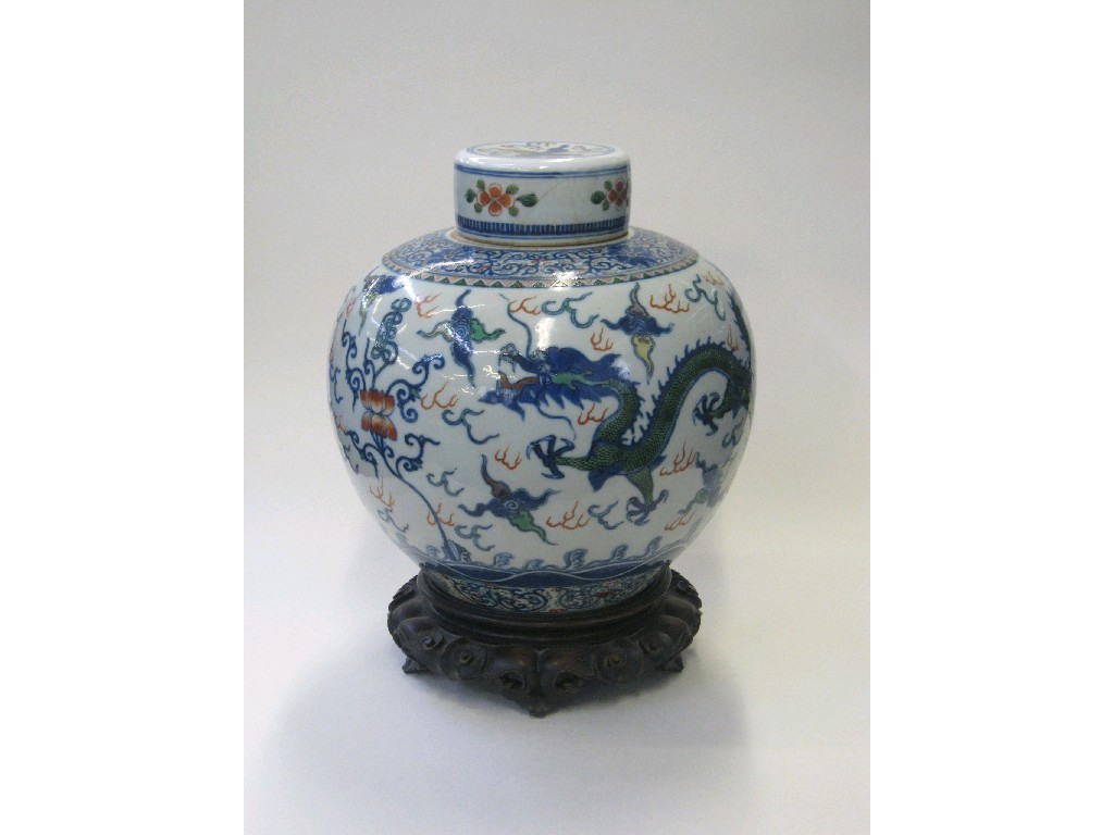 Appraisal: Chinese doucai ginger jar and cover on hardwood stand approx