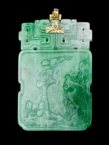 Appraisal: Chinese apple green and white jadeite pendantRectangular form scroll carved