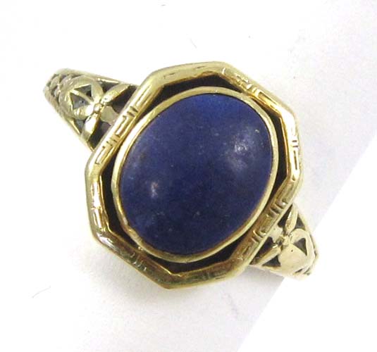 Appraisal: LAPIS LAZULI AND FOURTEEN KARAT GOLD RING featuring a single