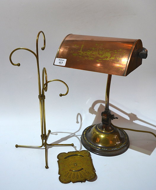 Appraisal: A brass and copper adjustable student's lamptogether with a brass